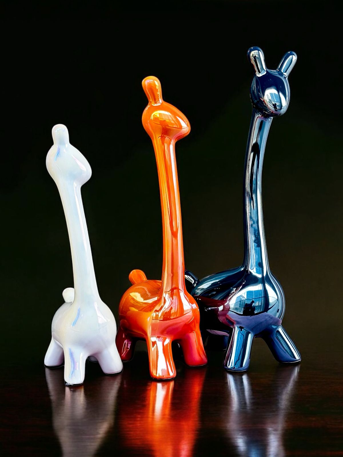Trio of Elegance: Glossy Ceramic Giraffe Set