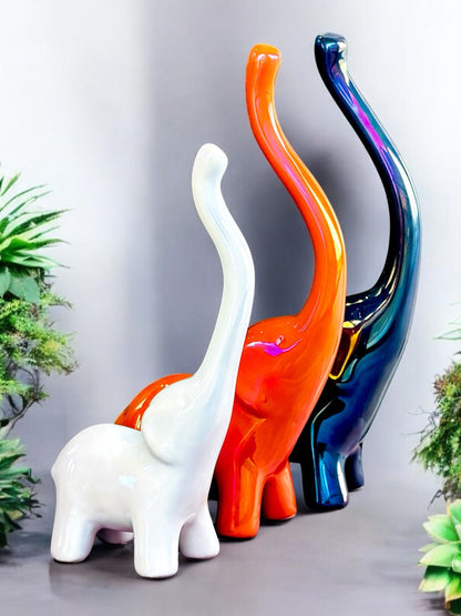 Trio of Elegance: Glossy Ceramic Elephant Set – Premium Home Décor Accent
