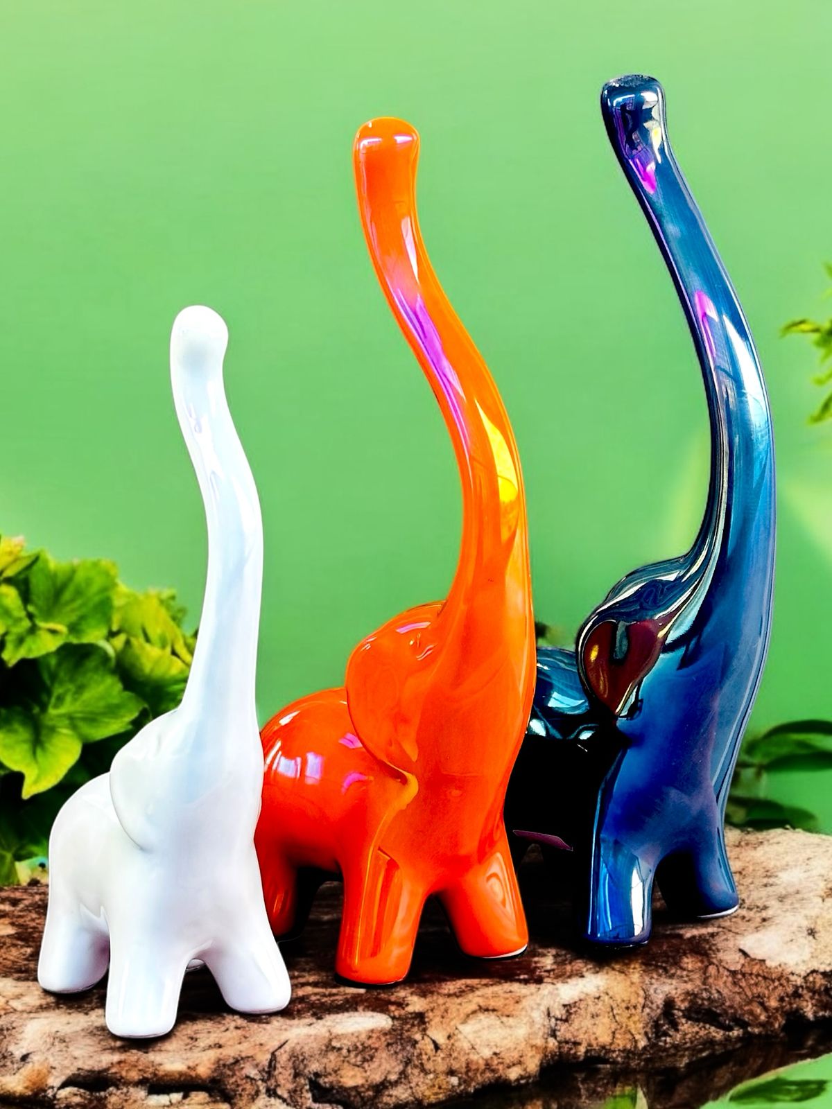 Trio of Elegance: Glossy Ceramic Elephant Set – Premium Home Décor Accent
