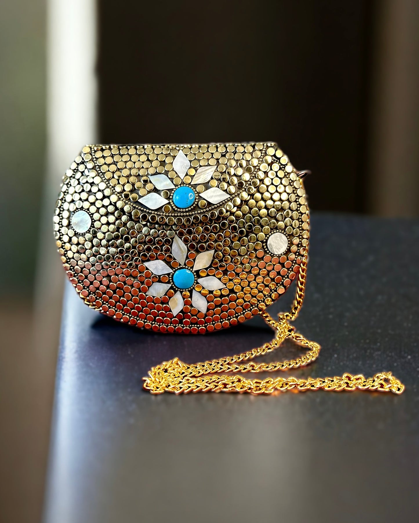 Mother of Pearl (MOP) Golden Embellished Metal Clutch