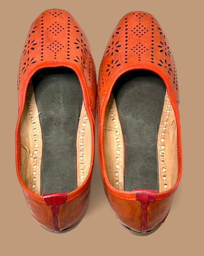 Artisanal Orange Leather Slip-on with Cutwork Inspired by Rajasthani Mojari Craftsmanship