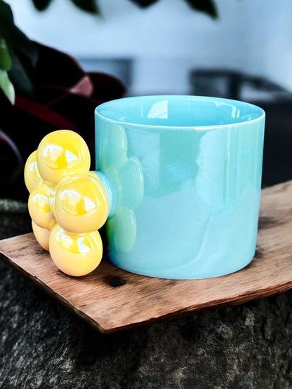 Contrast Charm: Dual-Tone Mug with Elegant Flower Handle